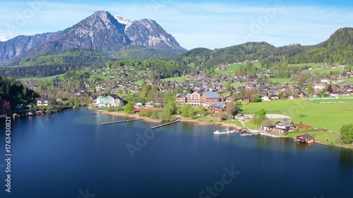 Experience breathtaking aerial views of Altausseer Lake in Austria Salzkammergut showcasing its clear waters, lush landscapes, and majestic mountains. Nature beauty in one spectacular shot.