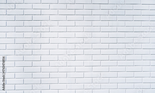 White brick wall background texture with detailed masonry pattern.