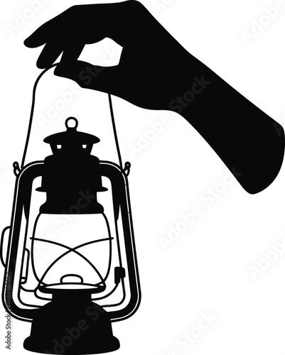 Hand holding a kerosene lantern with a warm glow silhouette