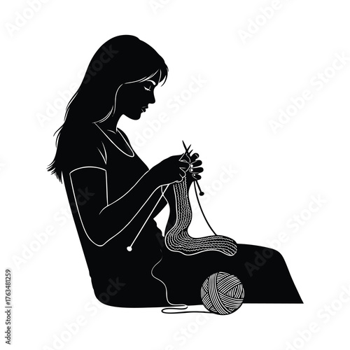 silhouette of a woman embroidering with wool thread
