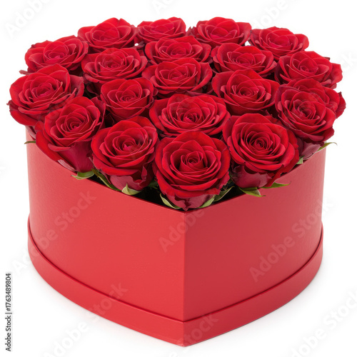 A heart shaped red box filled with many red roses sitting on a white background surface