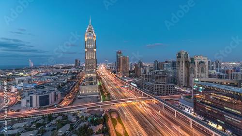 Photography Skyline internet city with crossing Sheikh Zayed Road aerial day to night timela