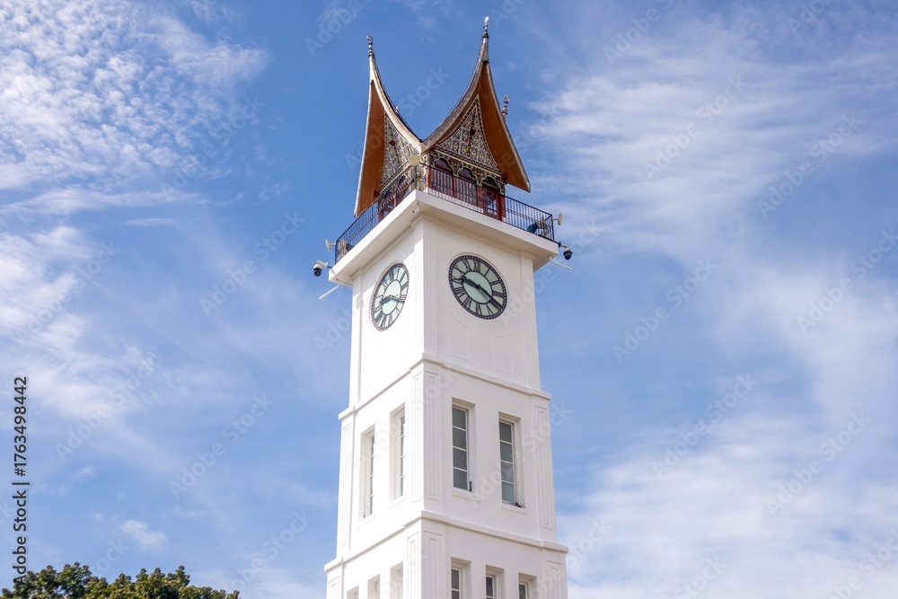 Fototapeta premium A clock tower called Jam Gadang, a tourist attraction in the city of Bukittinggi, West Sumatra, Indonesia