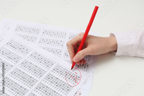 Female teacher writing resu...