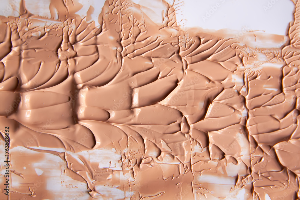 Obraz premium Fluid makeup product stain captured in soft light. A minimalist expression of skincare elegance.