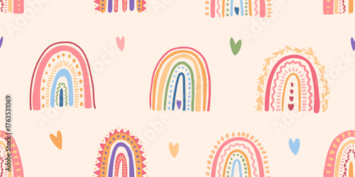 Seamless pattern with colorful hand-drawn rainbows and hearts. Cute boho vector background for kids, textile, wallpaper, wrapping paper, nursery decor, baby prints. Vector illustration.