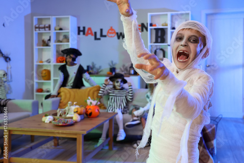 Scary little boy dressed as...