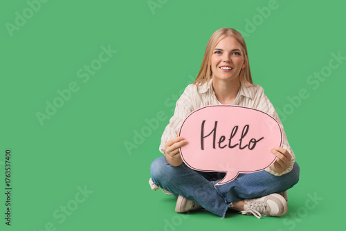 Young woman holding speech ...