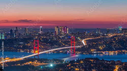 Istanbul city skyline cityscape time lapse from day to night view of bosphorus bridge and financial business center