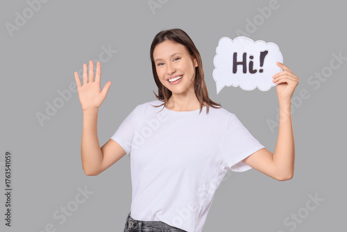 Young woman holding speech ...