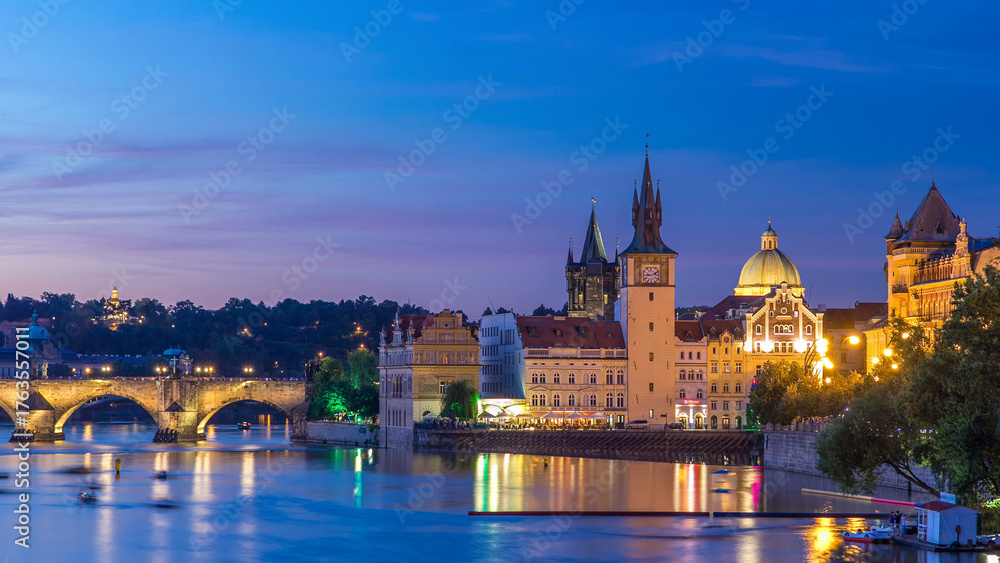 Naklejka premium View of the city Prague in Czech Republic day to night timelapse on the Vltava river with beautiful sky