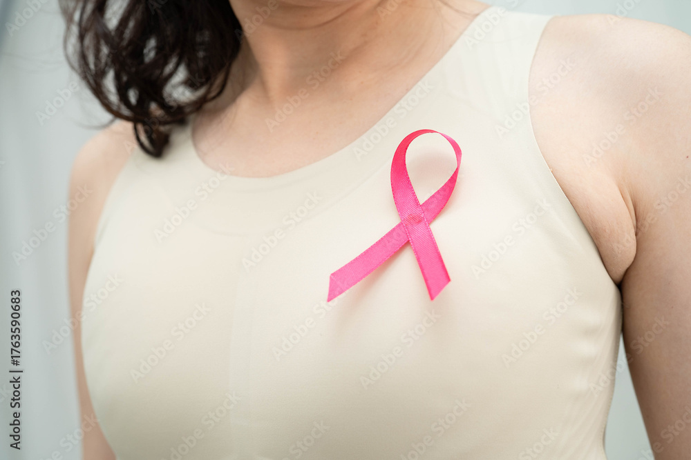 custom made wallpaper toronto digitalAsian woman with pink ribbon for October world breast cancer day.