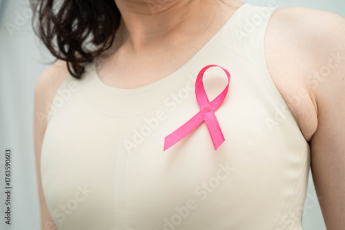 Wallpaper Mural Asian woman with pink ribbon for October world breast cancer day. Torontodigital.ca