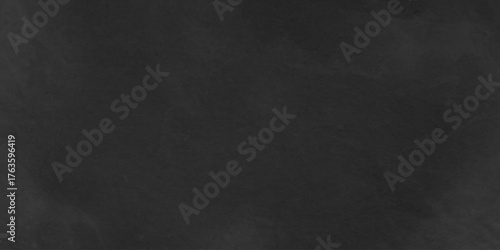 Abstract studio dark room concrete floor texture background. Black or dark gray rough grainy stone texture. Old wall texture cement grey color design are light with white gradient background.	