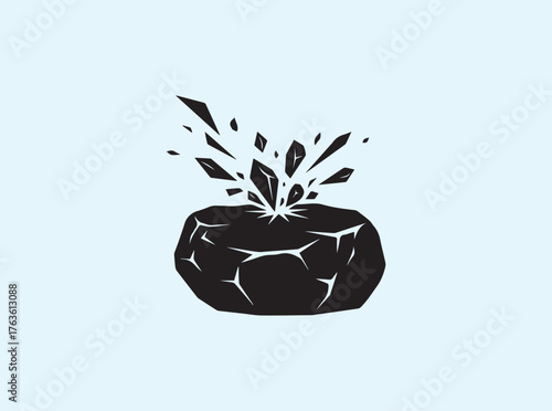 Powerful Silhouette of Hammer Cracking Rock Showing Energy and Breakthrough
