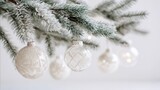 Elegant Christmas Ornaments Hanging on Snowy Evergreen Branch, Festive Holiday Season Decoration, Minimalist Festive Still Life