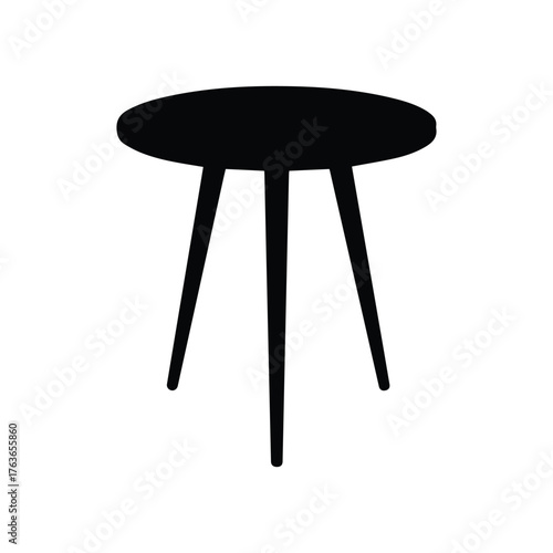 Minimalist Table Silhouette: A sleek, three-legged table, designed with minimalist aesthetic, its dark form contrasts with the blank surrounding. 
