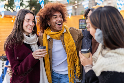 Photography Multiracial young group of friends having fun together at christmas market on wi
