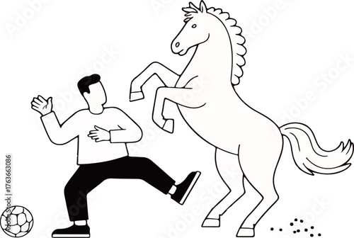 Man playing soccer with a rearing horse