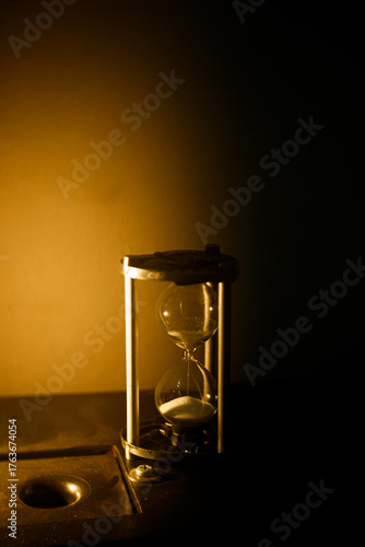 hourglass on black background