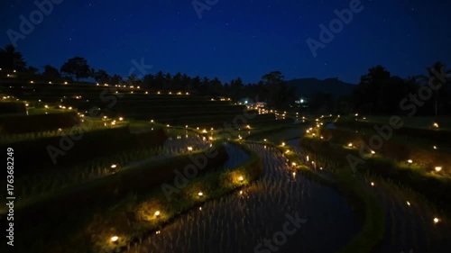 Nighttime Rice Terraces Illuminated by Lanterns with Cinematic Rural Serenity