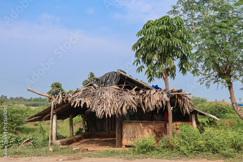 Indian farmer house in a rural agricultural village. Traditional Indian style hut or village house.
