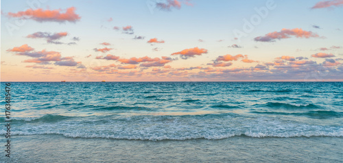 Fototapeta Naklejka Na Ścianę i Meble -  Sunrise with sea beach. Dramatic sunrise horizon at sea. Romantic summer vacation on sunset seascape. Sea sunset on ocean. Sunset seascape at summer vacation. Serene horizon