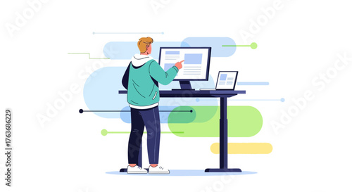 A man working on his computer in a modern office, standing at his desk no commas