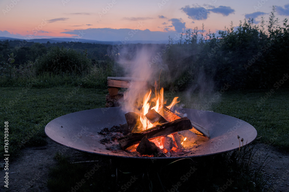 custom made wallpaper toronto digitalround circle fire pit burning logs at sunset in catskills mountains catskill upstate new york travel camping leisure scenic nature landscape flame wood wooden log warmth cozy outdoor adventure