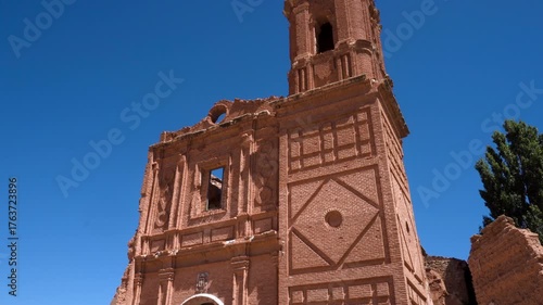 Ruins of the Convent of San Agustin in Belchite, Spain. The destroyed structure stands as a silent witness to the Spanish Civil War, showing weathered stone walls and haunting beauty under natural