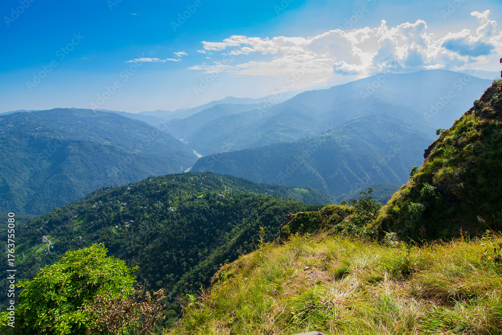 Naklejka premium Tarey Bhir point is a favourite tourist spot.The word 'Bhir' means cliff in the local Nepal language,about 10,000 feet long path, a breathtaking viewpoint at the edge, people get spectacular views.
