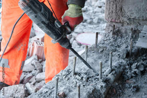 WORKING WITH A JIG HAMMER DURING BUILDING RECONSTRUCTION