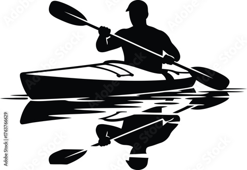 Silhouette of a person kayaking on water with reflection
