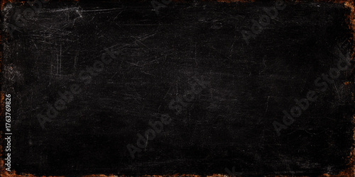 Vintage Black Chalkboard Texture with Scratches Dust and Worn Edges for Grunge Retro Backgrounds.