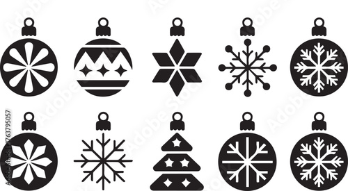 Assortment of Black and White Christmas Ornaments and Snowflake Decorations on a White Background
