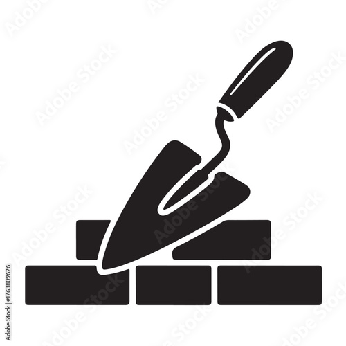 Illustration of a trowel on bricks, isolated on white background, representing construction and masonry work