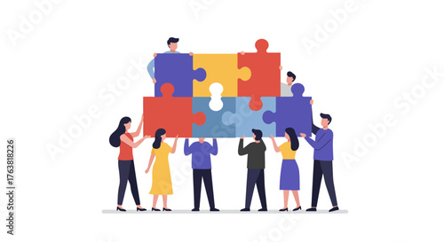 Team collaboration concept with diverse people assembling colorful puzzle pieces