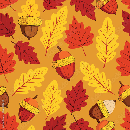 Autumn pattern with colorful leaves and acorns on a warm background