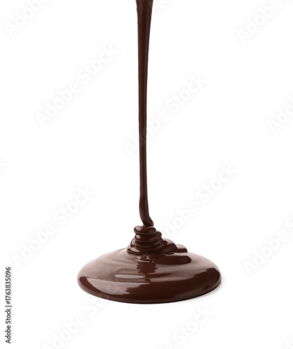 Pouring tasty melted chocolate on white background