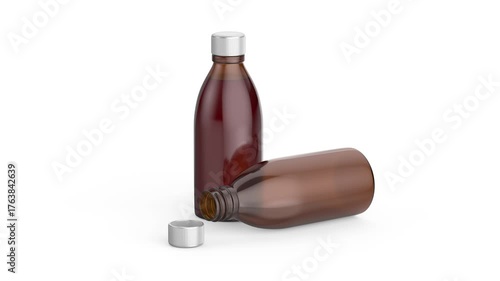 Two amber glass medical bottles on white background