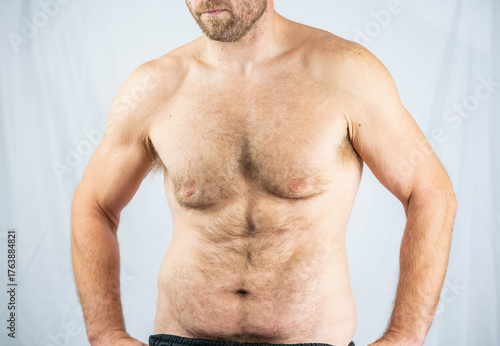 Billede på lærred Studio shot of white male after weight lose, fit man average build, handsome, ha