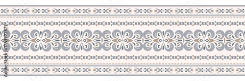 Ornate seamless border with floral motifs in soft pastel tones. Horizontal narrow seamless pattern in Indian, arabic, european style for wallpaper borders, fabric, stationery, gift wrapping, holidays.