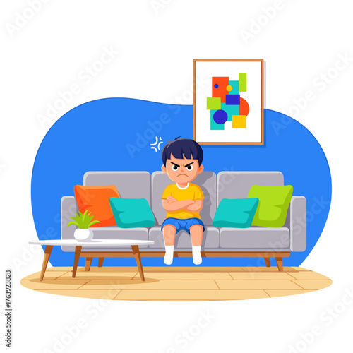 Young boy sitting angrily on a sofa in a colorful living room  