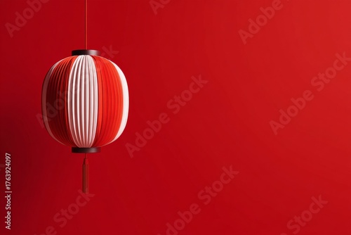 Bright Red Lantern Decorates a Simple Wall for Festive Occasions or Celebrations