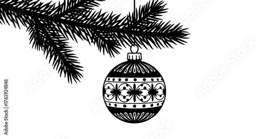 Black and white christmas ornament hanging from pine branch silhouette
