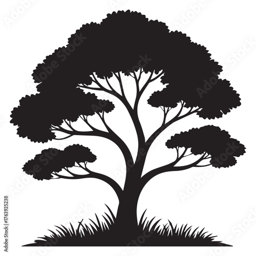 Silhouette of a majestic tree with lush foliage and a sturdy trunk, standing proudly amidst a patch of vibrant grass, isolated on white background, creating a serene and natural scene