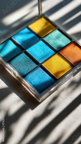 Colorful Eyeshadow Palette With Vibrant Shades Displayed Beautifully Under Na...