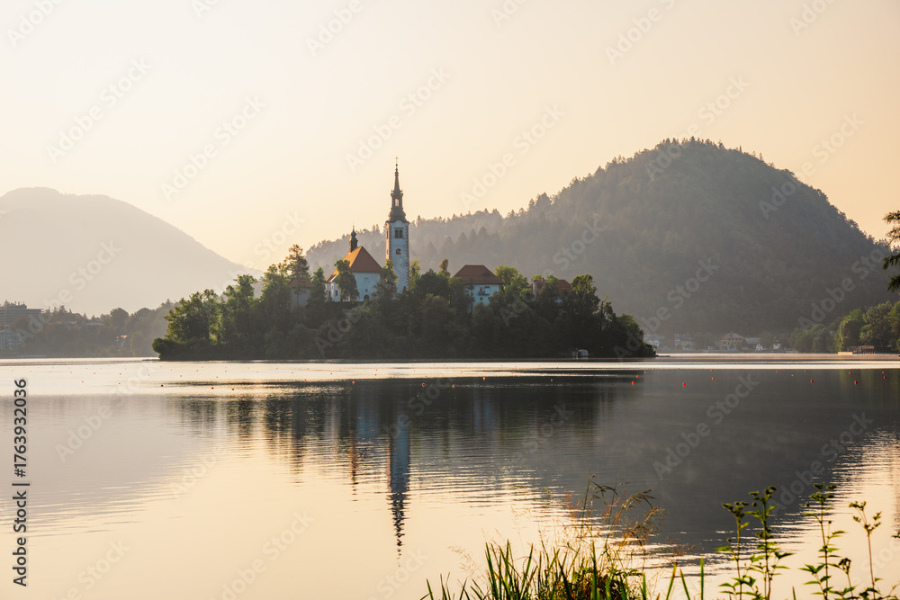 Fototapeta premium Bled, Slovenia. Lake Bled with the Church of the Assumption of Maria and Julian Alps in the background
