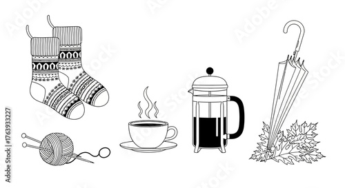 Cozy autumn essentials with knitting, coffee, and umbrella in monochrome design