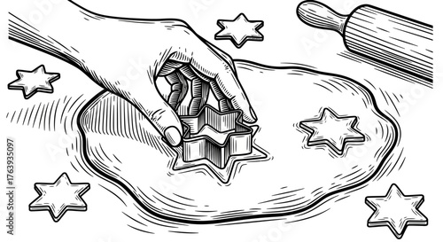 Hand cutting star shapes in dough with rolling pin in vintage black and white style